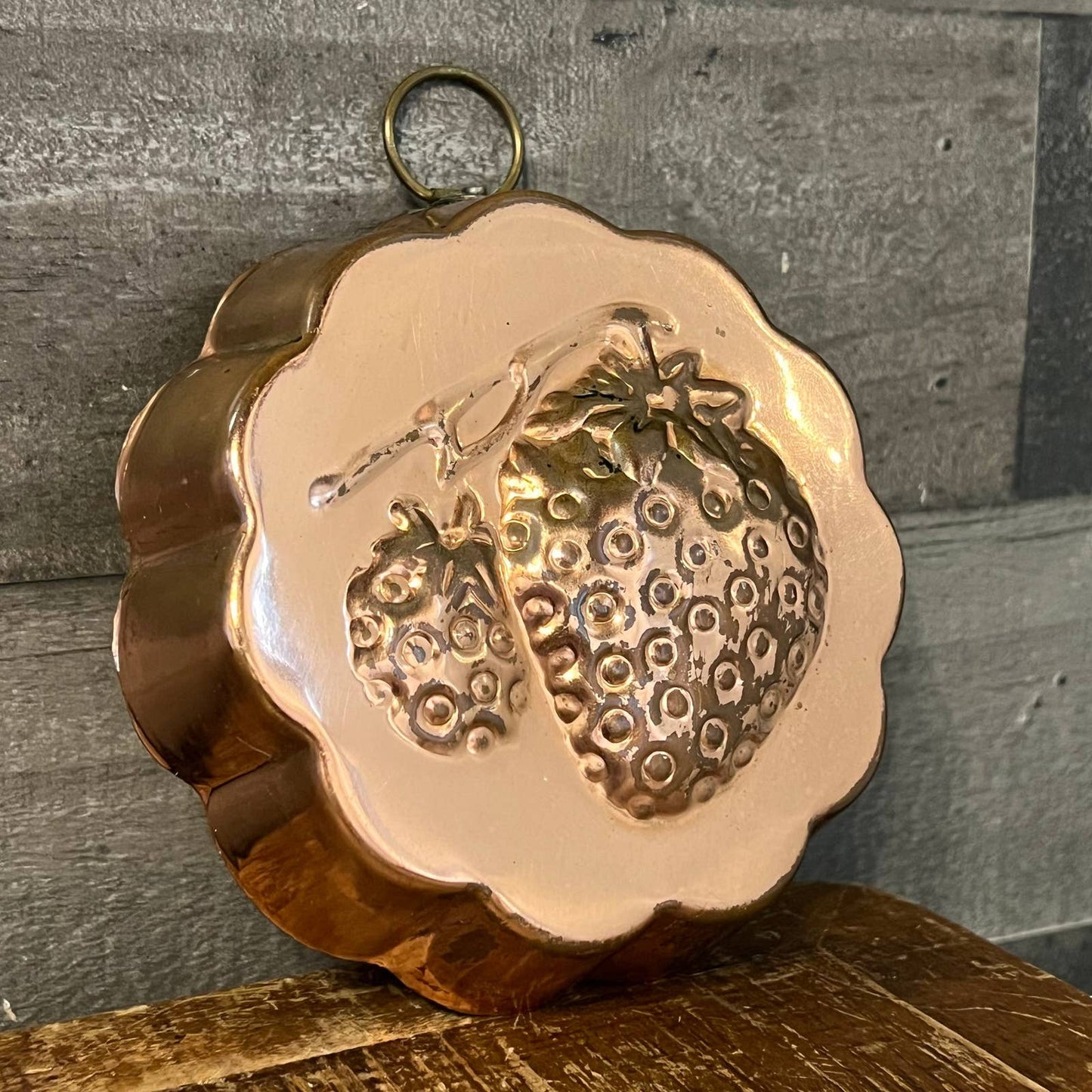 Vintage copper scallop rim strawberry motif wall hanging mold