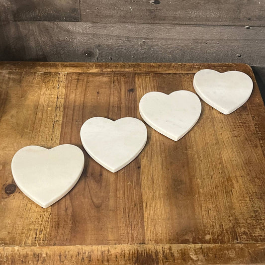 4 white marble heart shaped coasters