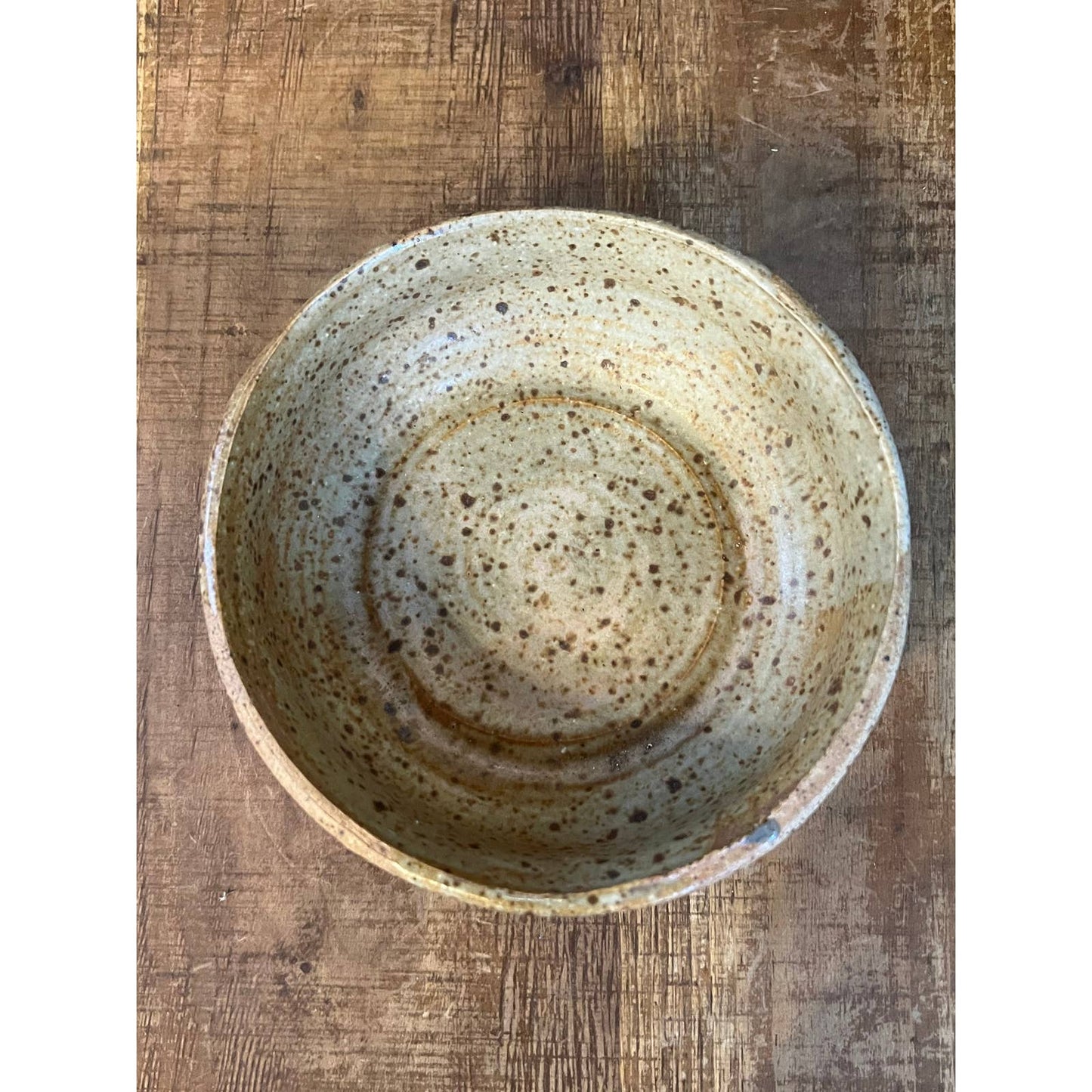 Neutral tone beige speckled glaze pottery bowl