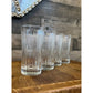 Set of 4 ribbed flared rim clear glass tall tumblers