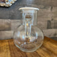 Vintage clear glass pitcher with white plastic lid