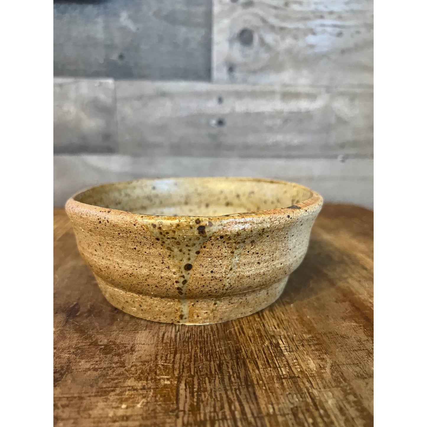 Neutral tone beige speckled glaze pottery bowl