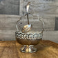 Vintage silver plated basket shaped footed sugar bowl with scalloped handle and spoon