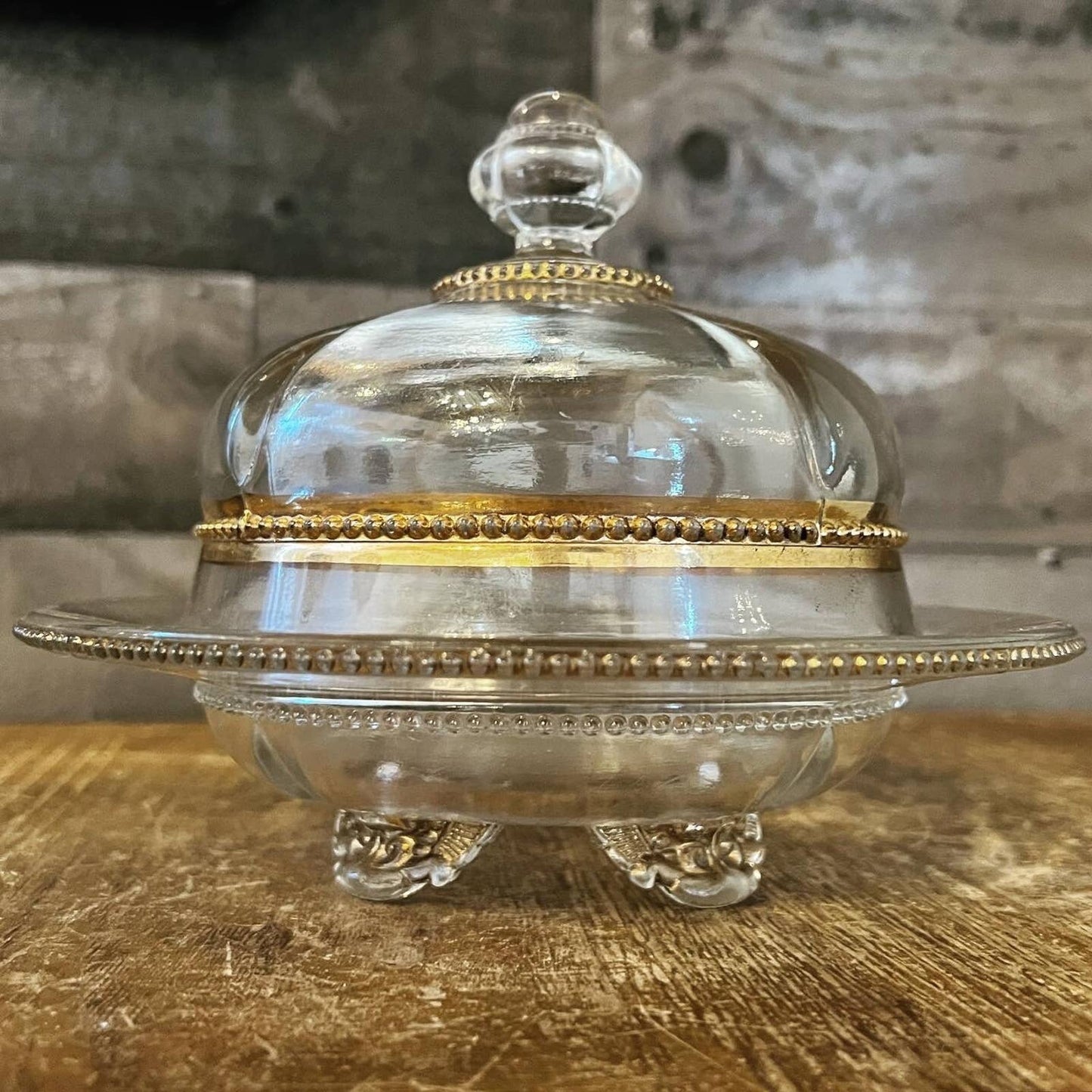 Vintage Victorian style footed clear glass and gold butter dome