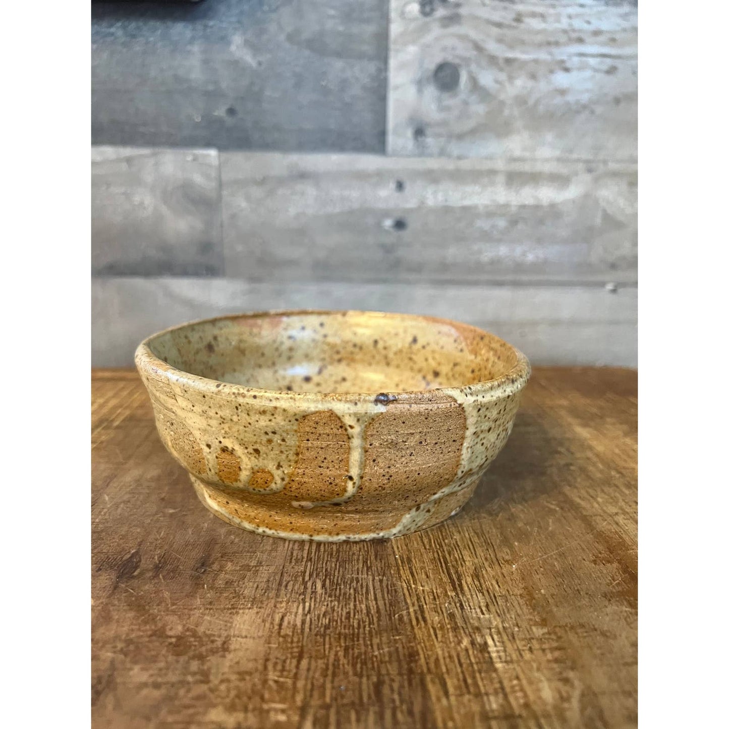 Neutral tone beige speckled glaze pottery bowl