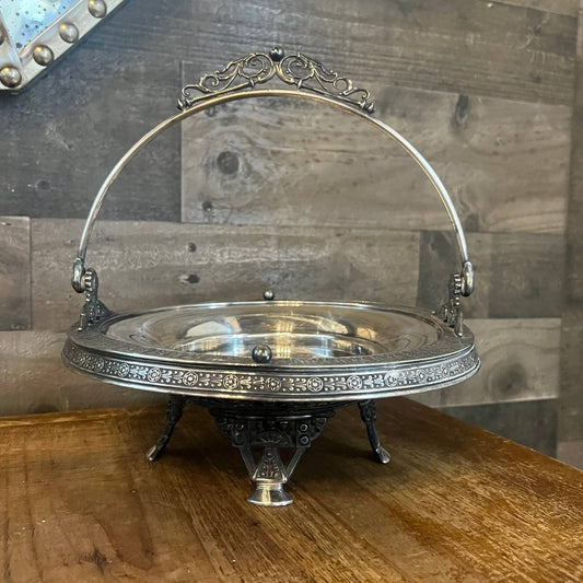 Simpson Hall Miller & Co silverplated round footed handled basket tray