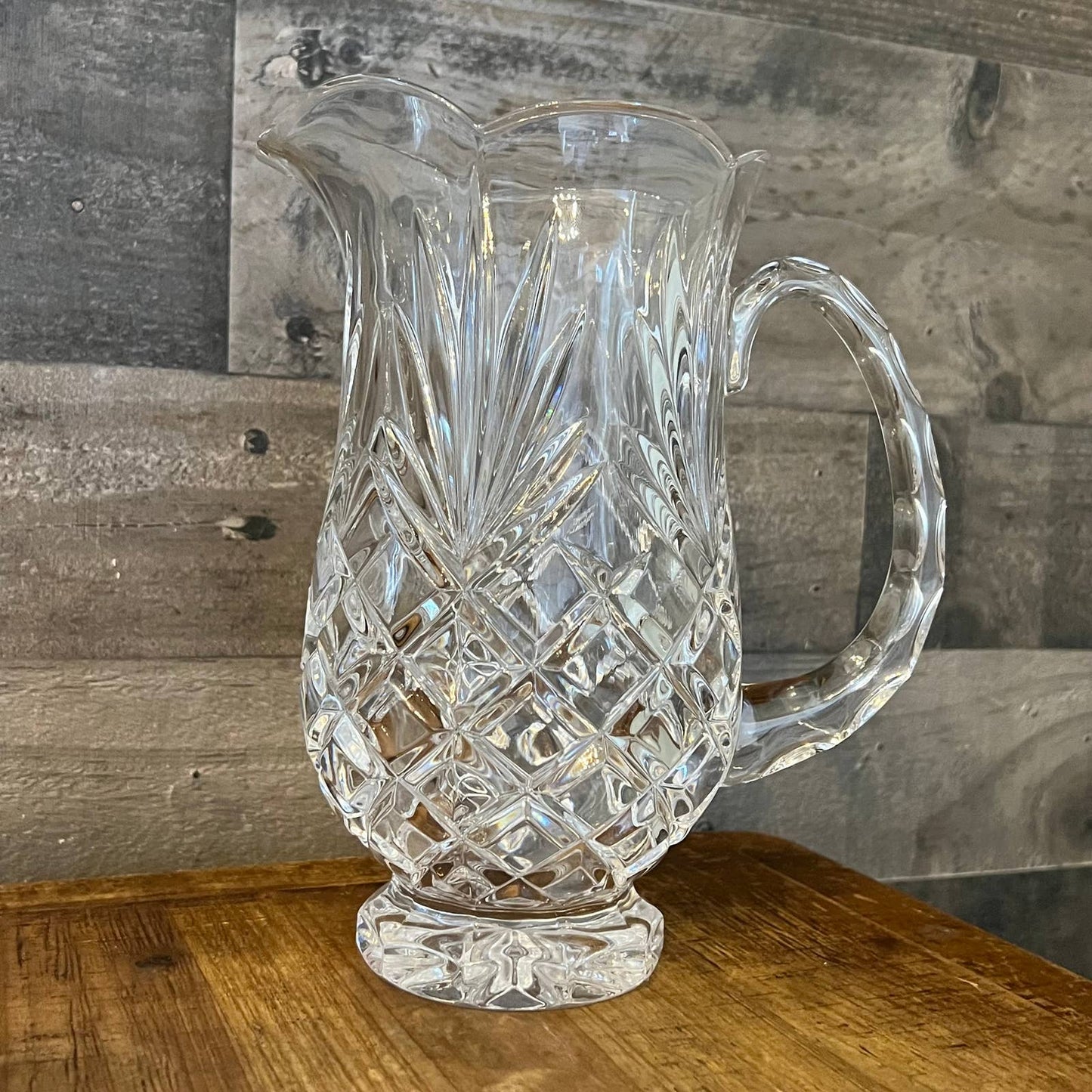 Crystal scallop rim cut to clear heavy pitcher