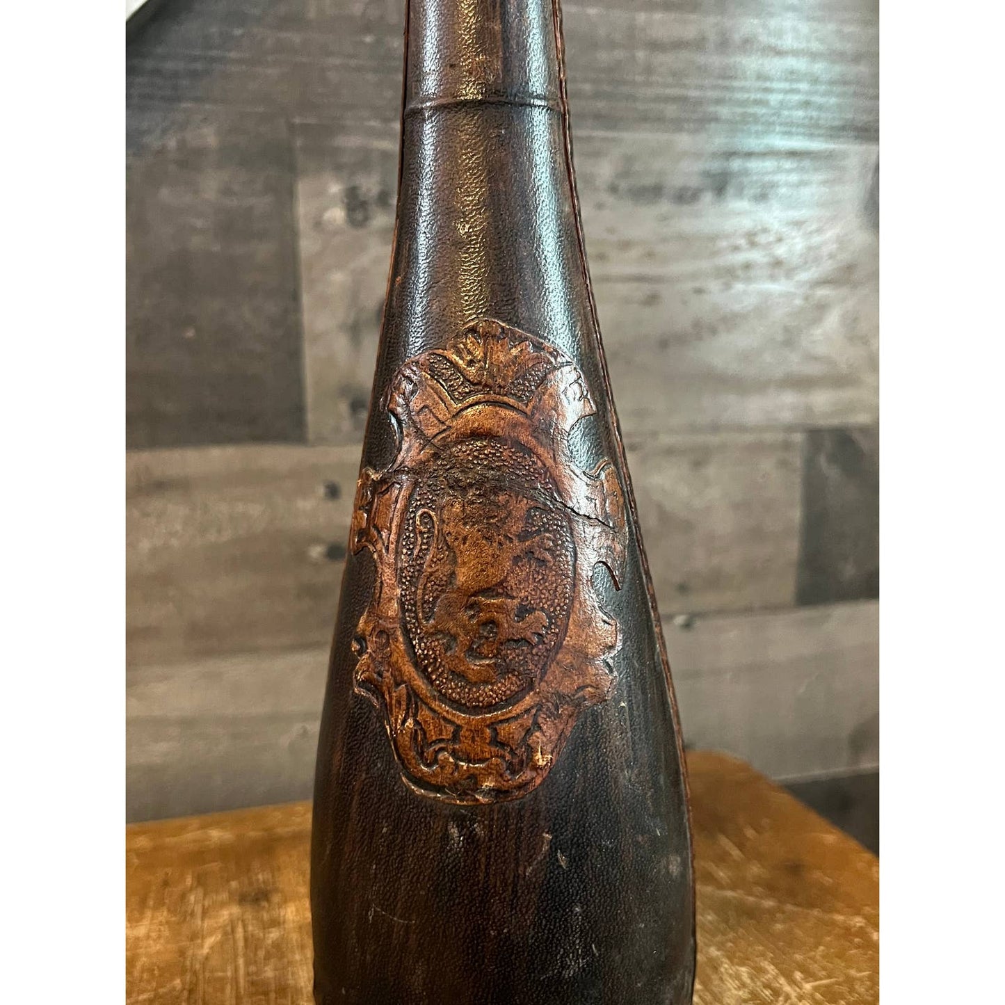 Vintage lion crest Italian leather decanter bottle with leather stopper