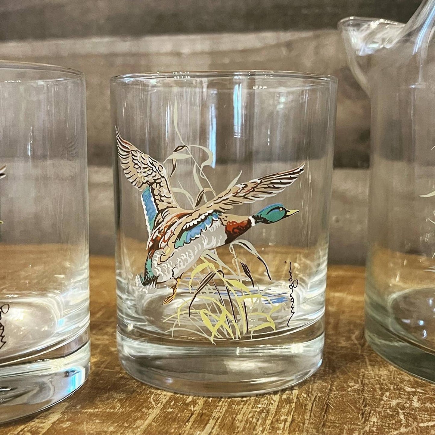 Set of 3 glass duck glasses and glass duck handled pitcher - artist signed Morgan - lake house glasses - cabin / camp glasses - bar glasses