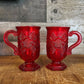 Pair of vintage Avon Ruby red pedestal mugs