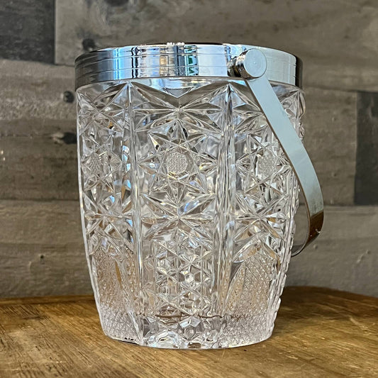 Vintage crystal ice bucket with chrome rim and handle