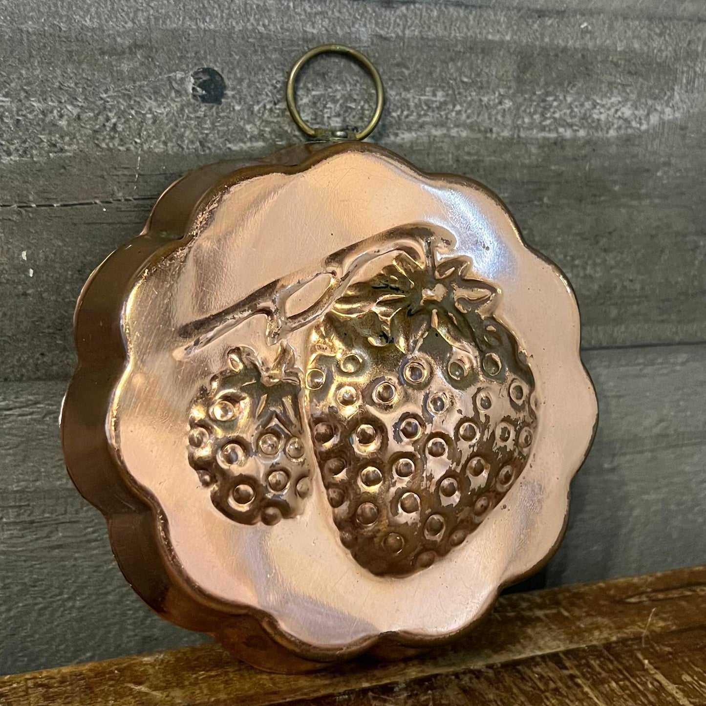 Vintage copper scallop rim strawberry motif wall hanging mold