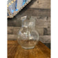 Clear glass bubbly handled beverage pitcher