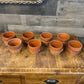 Petite wicker basket planter pots - set of 4