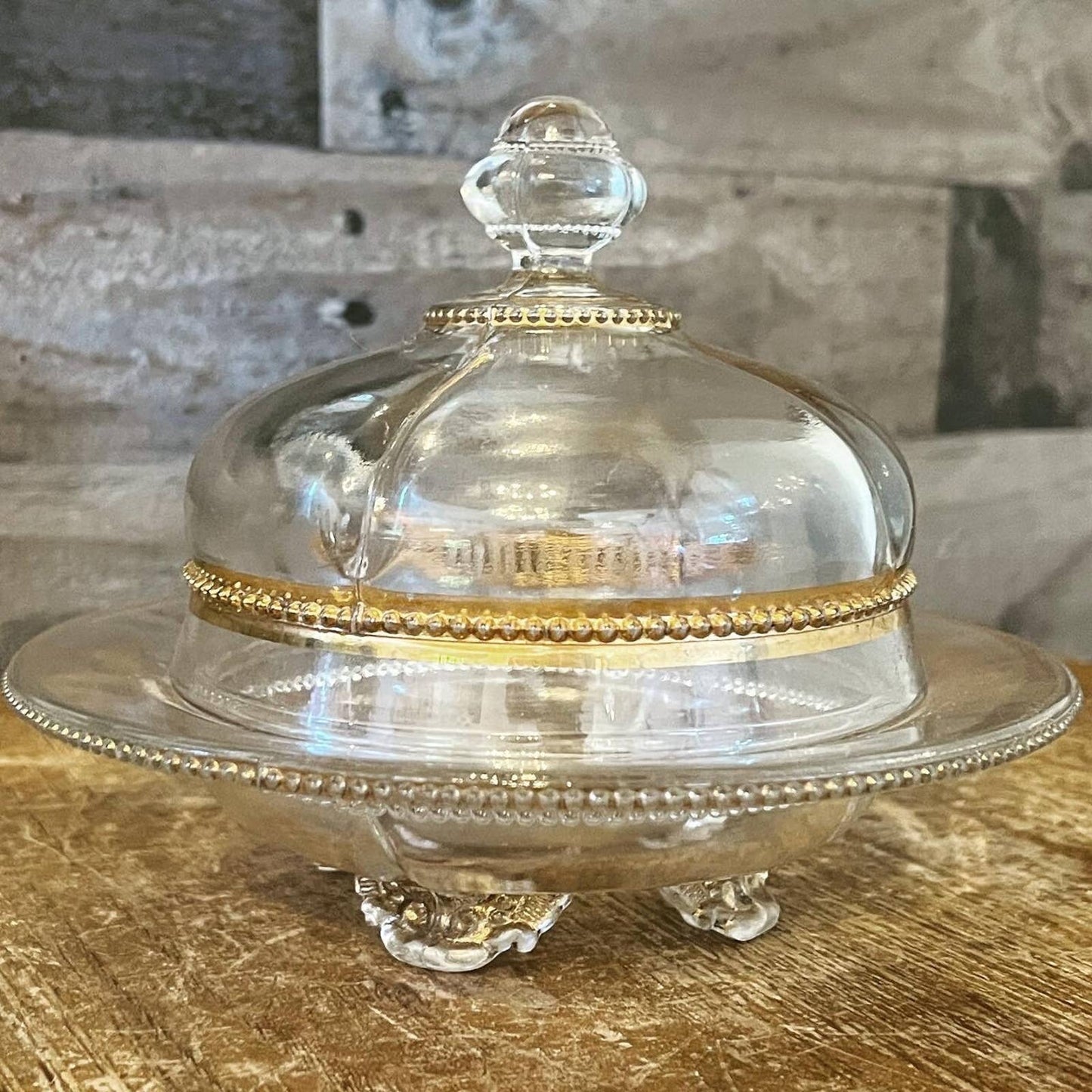 Vintage Victorian style footed clear glass and gold butter dome