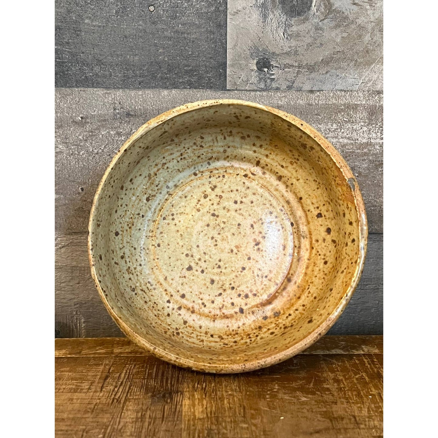 Neutral tone beige speckled glaze pottery bowl